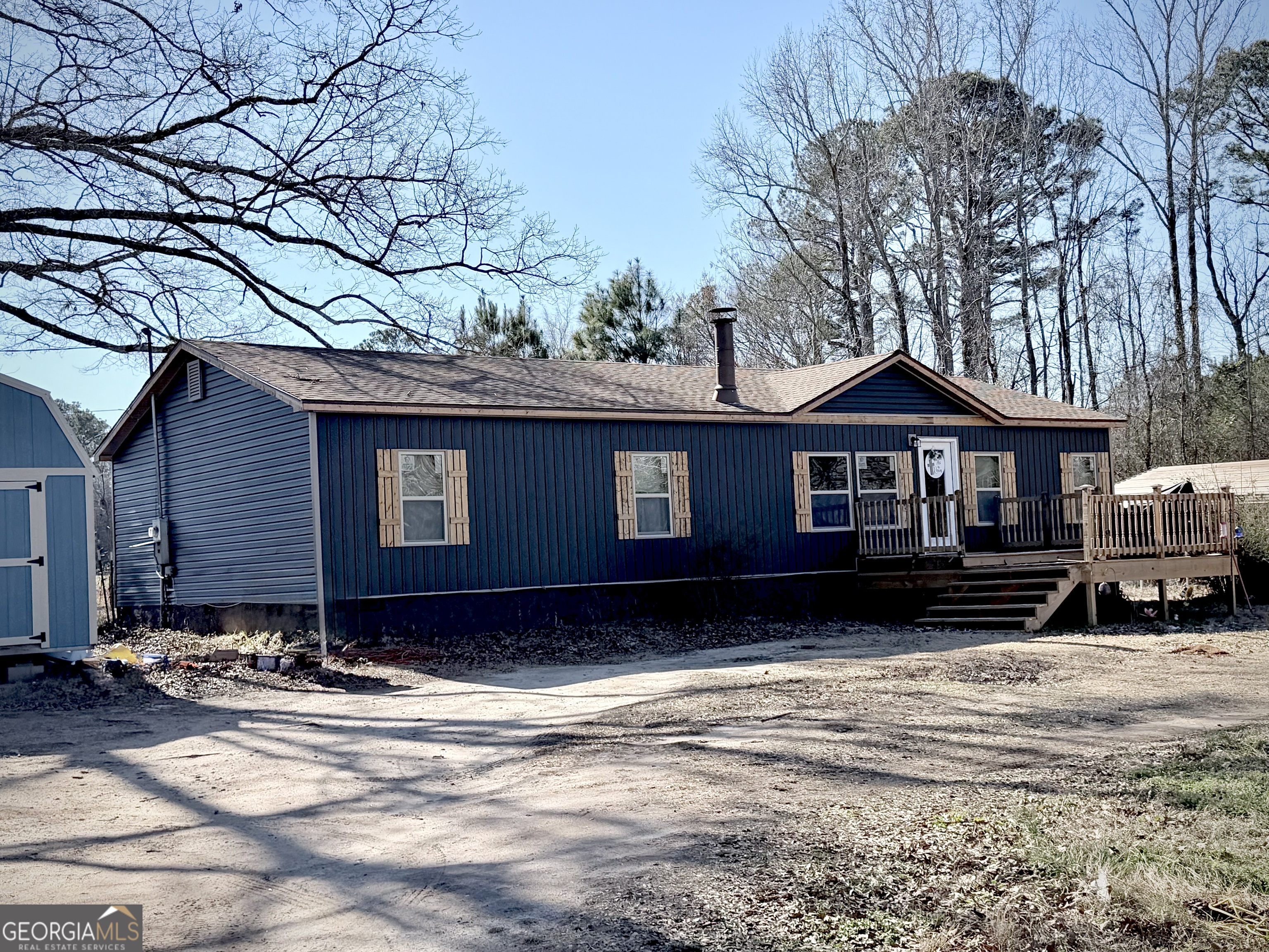 5448 Blanton Mill Road Williamson, GA 30292 - Photo 43 of 50 a front view of a house with a yard