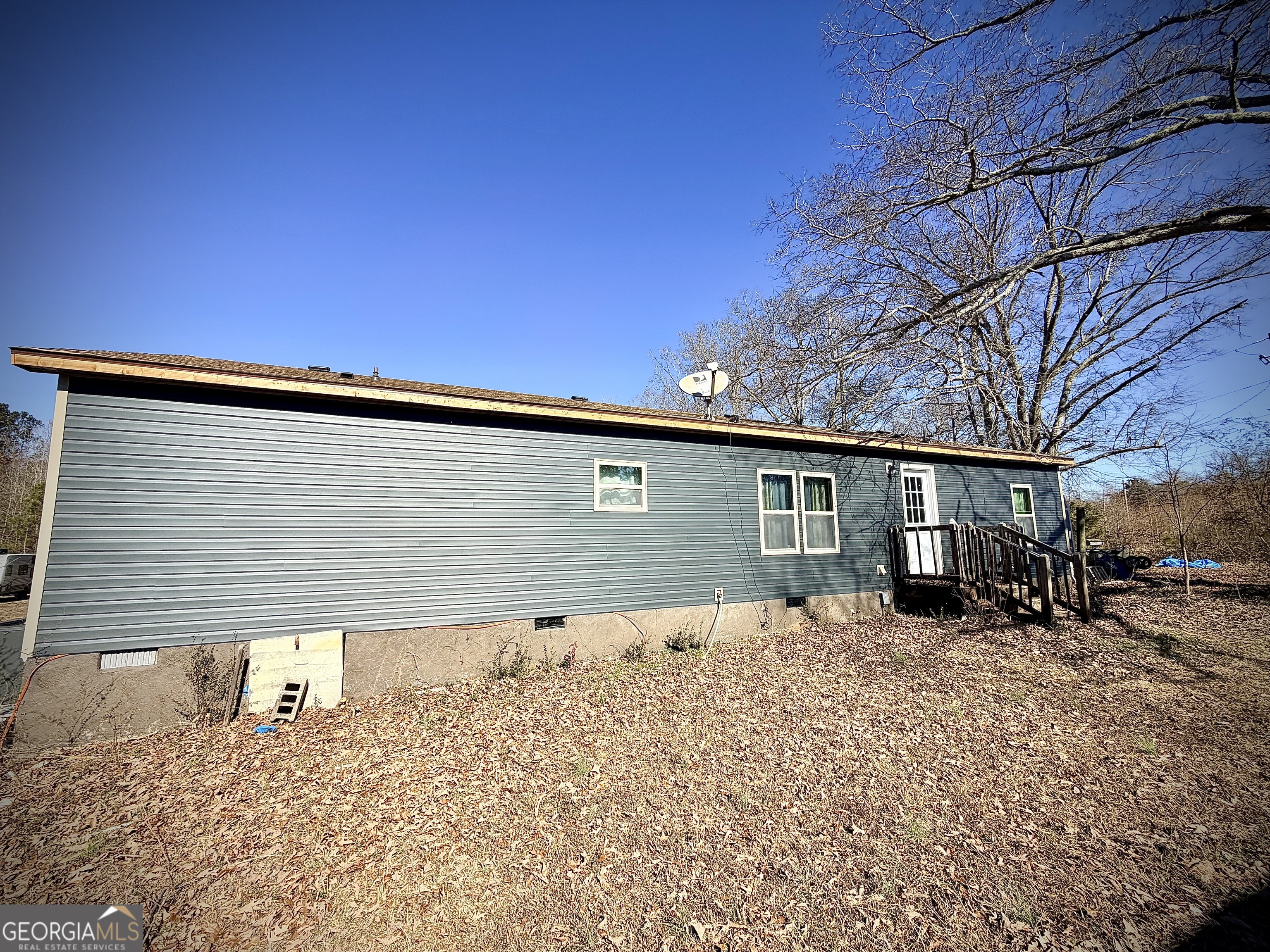 5448 Blanton Mill Road Williamson, GA 30292 - Photo 48 of 50 a front view of a house with a yard