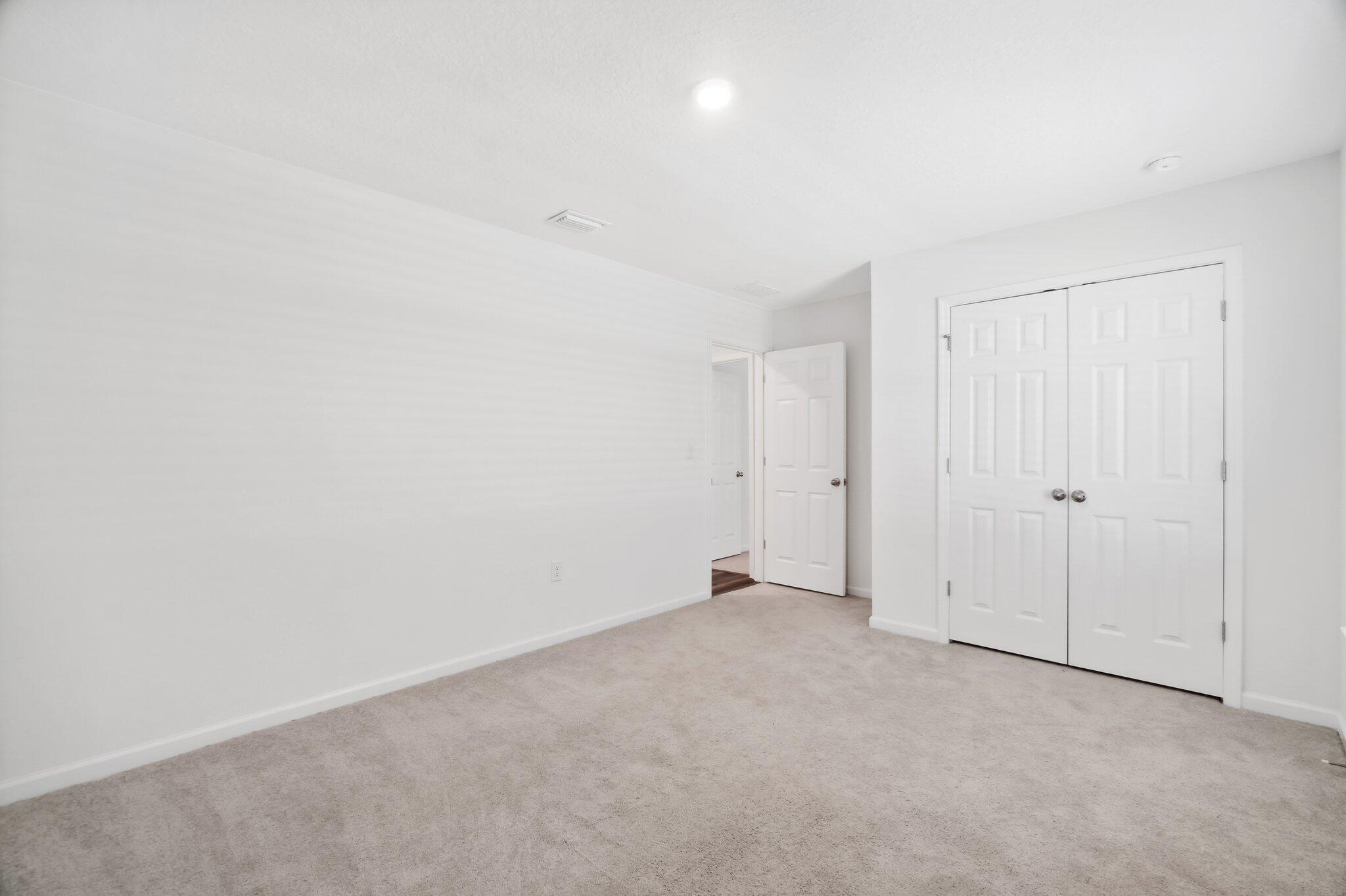 720 Riverwalk Circle Freeport, FL 32439 - Photo 12 of 34 a view of an empty room