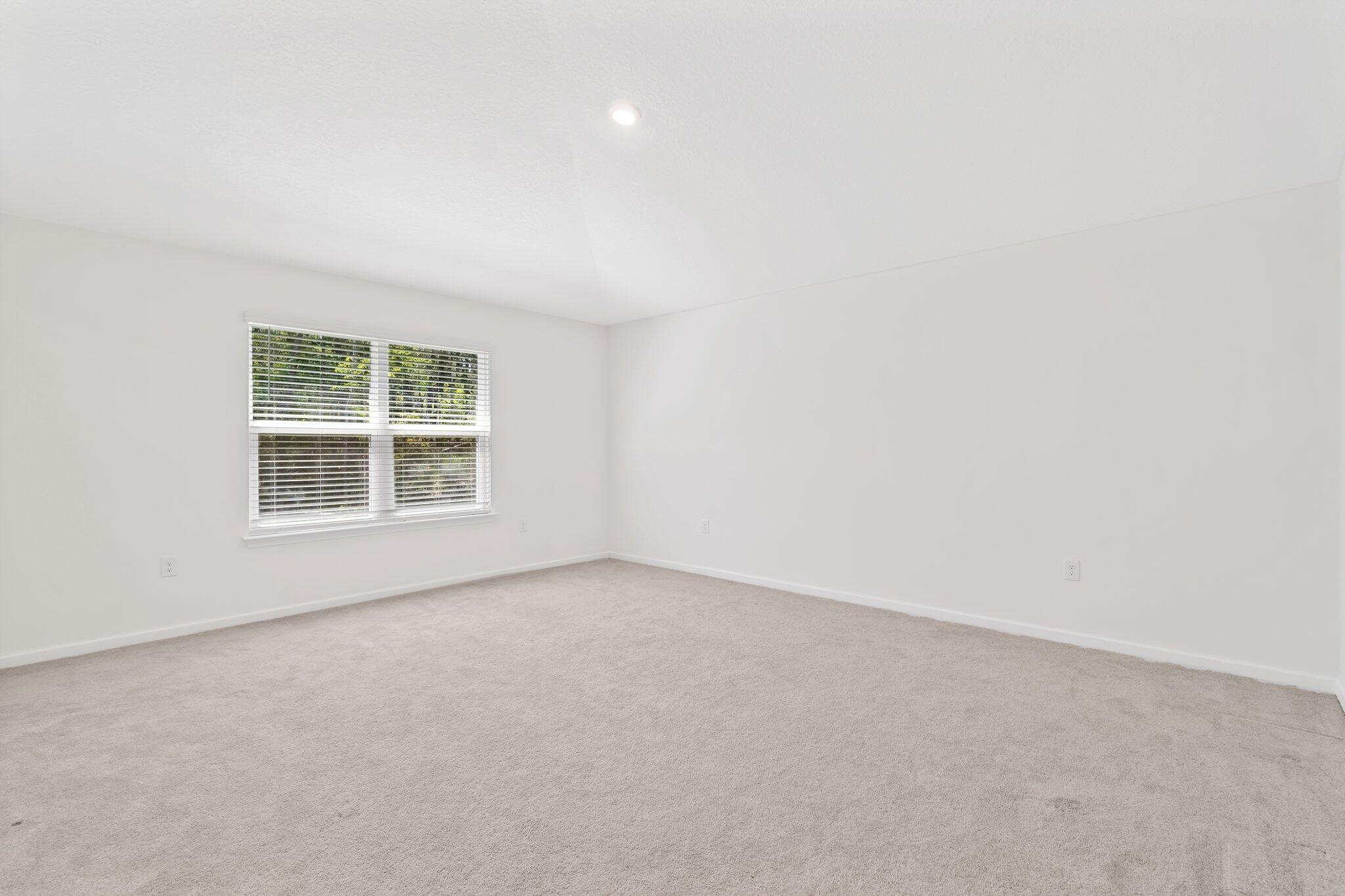 720 Riverwalk Circle Freeport, FL 32439 - Photo 23 of 34 an empty room with a window