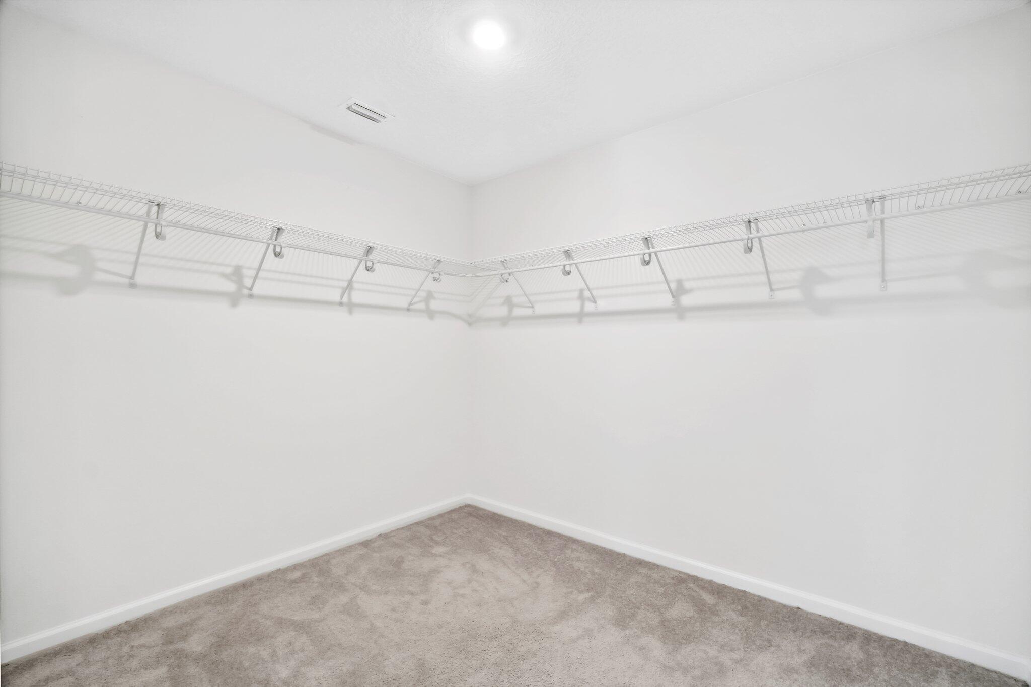 720 Riverwalk Circle Freeport, FL 32439 - Photo 25 of 34 a view of a room with racks on the wall