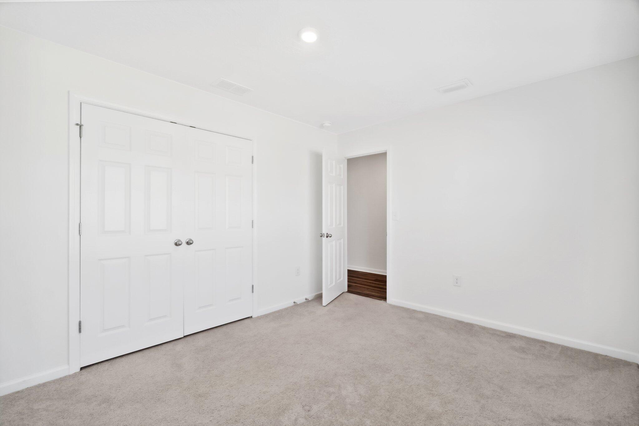 720 Riverwalk Circle Freeport, FL 32439 - Photo 6 of 34 a view of an empty room