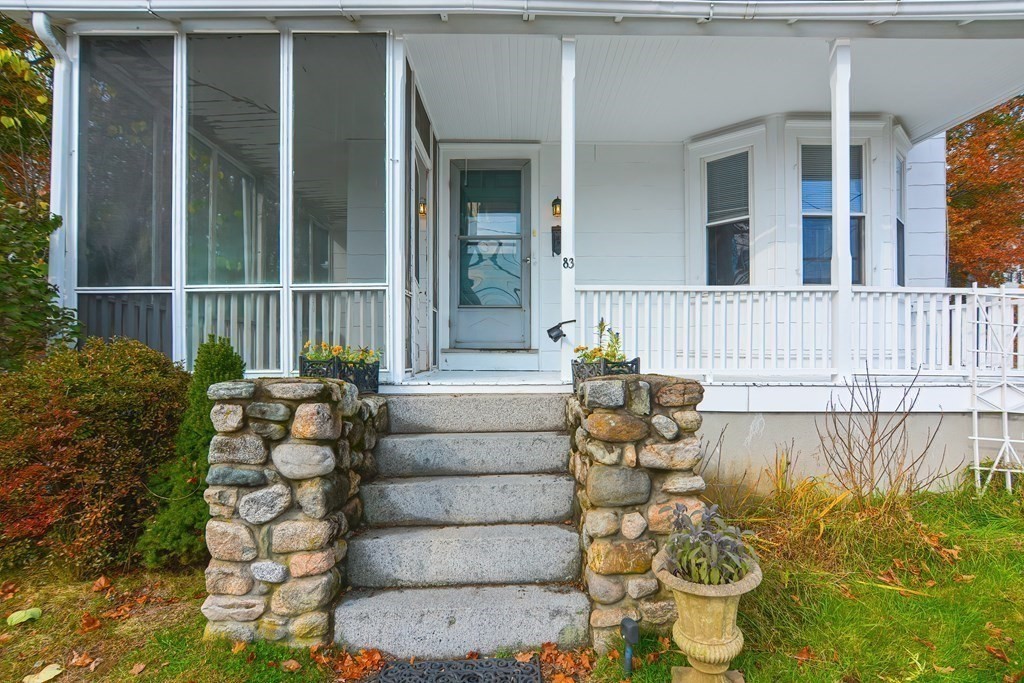 83 Eliot Street Natick, MA 01760 - Photo 3 of 42 a front view of a house with plants