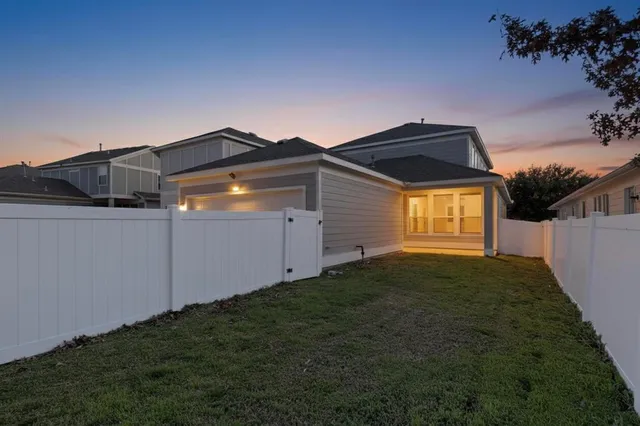 a view of backyard of house