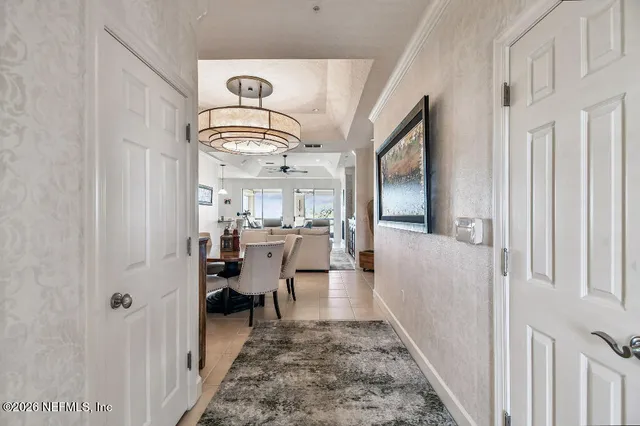 a bathroom with a toilet and a window