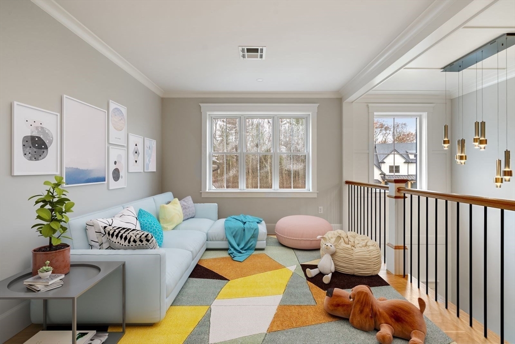 3 Whisper Way Hopkinton, MA 01748 - Photo 12 of 24 a living room with furniture and a large window