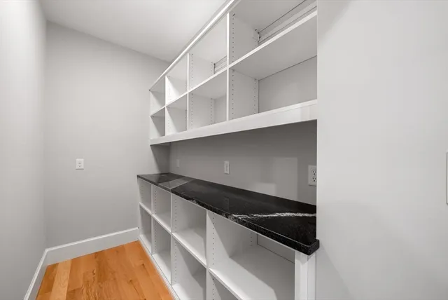 a utility room with washing machine