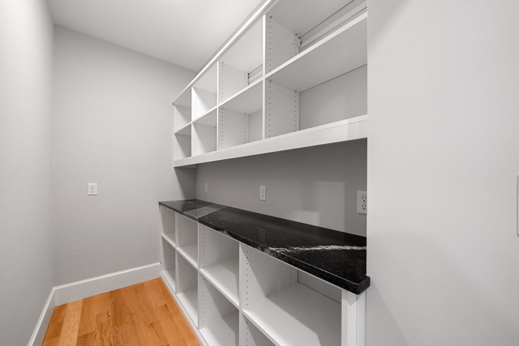 3 Whisper Way Hopkinton, MA 01748 - Photo 8 of 24 a utility room with washing machine