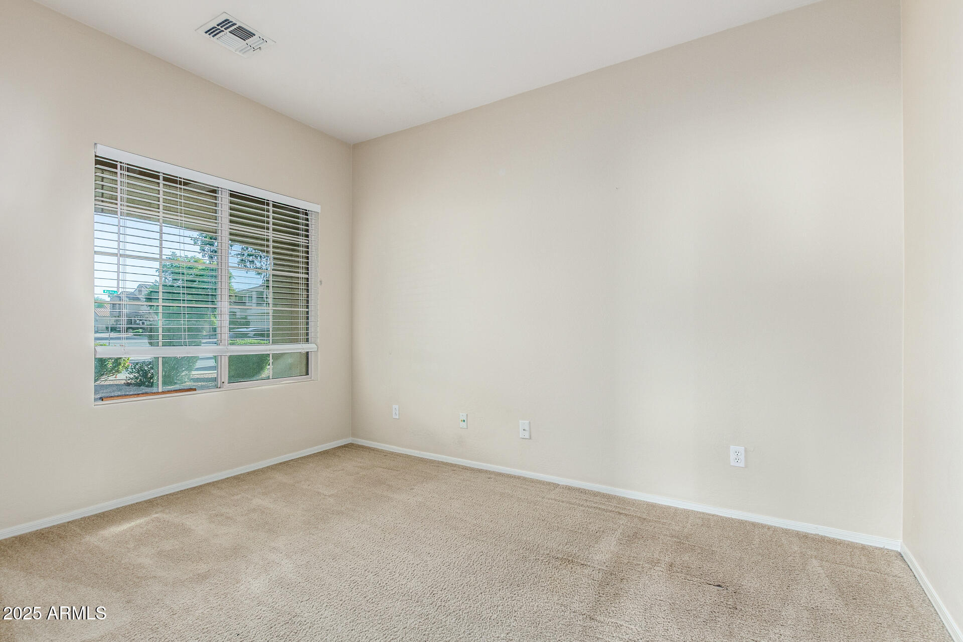 4480 South Marble Street Gilbert, AZ 85297 - Photo 21 of 26 a view of an empty room with a window