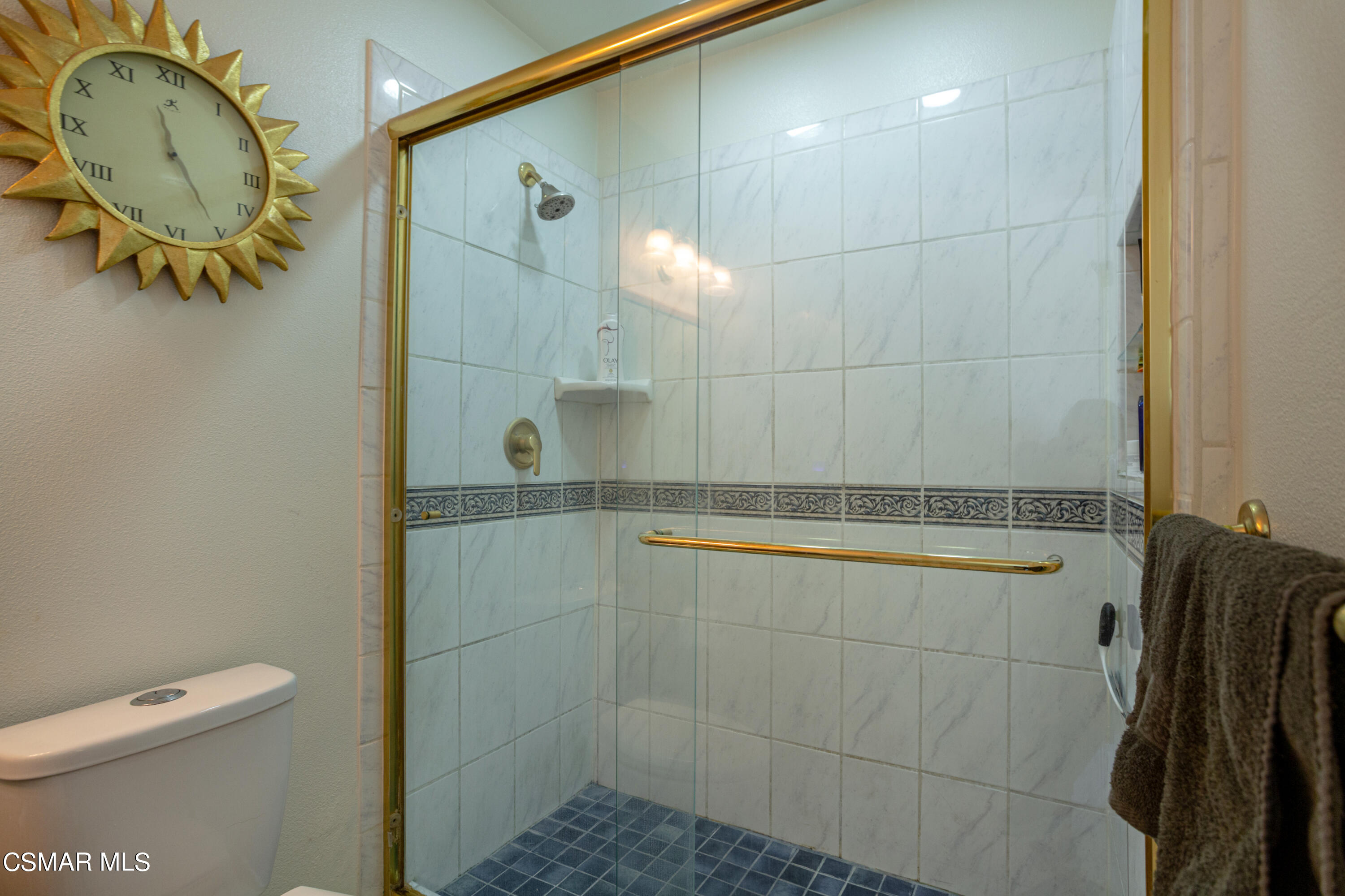 2641 Greenleaf Court Simi Valley, CA 93063 - Photo 15 of 25 a bathroom with a shower a toilet and sink