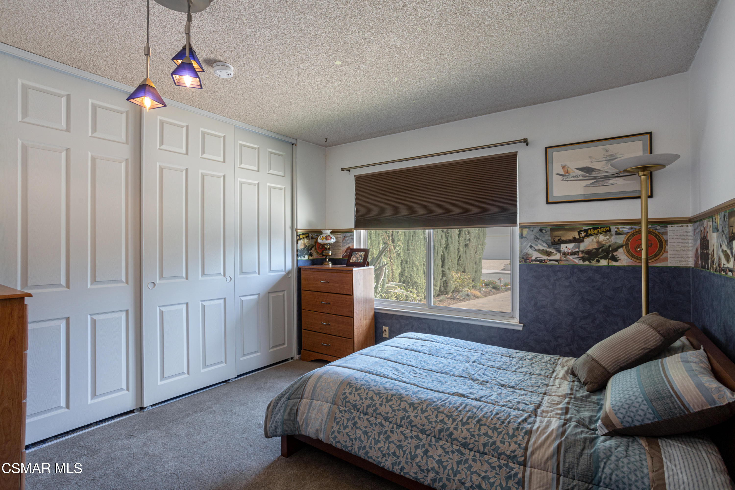 2641 Greenleaf Court Simi Valley, CA 93063 - Photo 18 of 25 a bedroom with a bed and a window