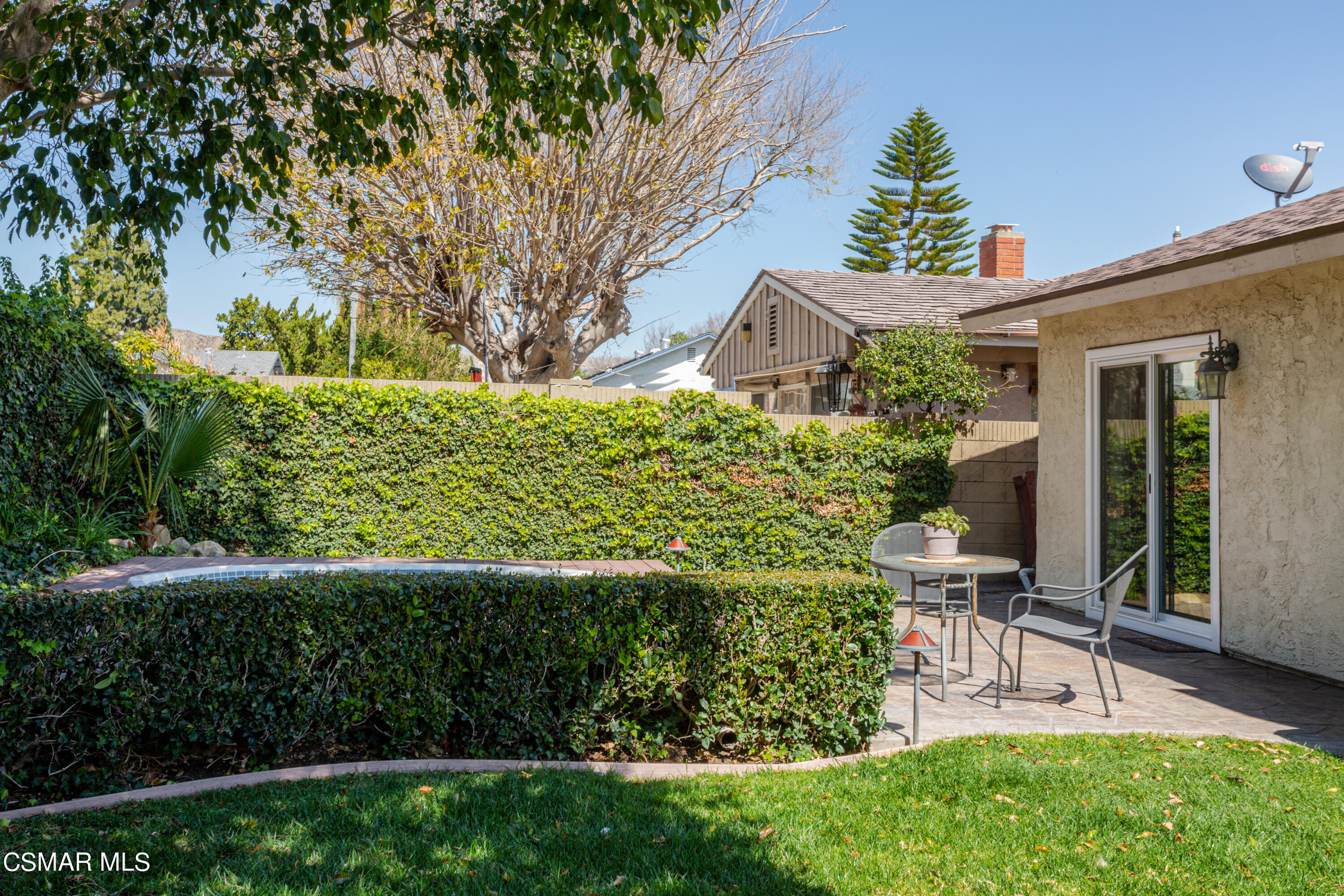 2641 Greenleaf Court Simi Valley, CA 93063 - Photo 23 of 25 a view of a chair and table in backyard of the house
