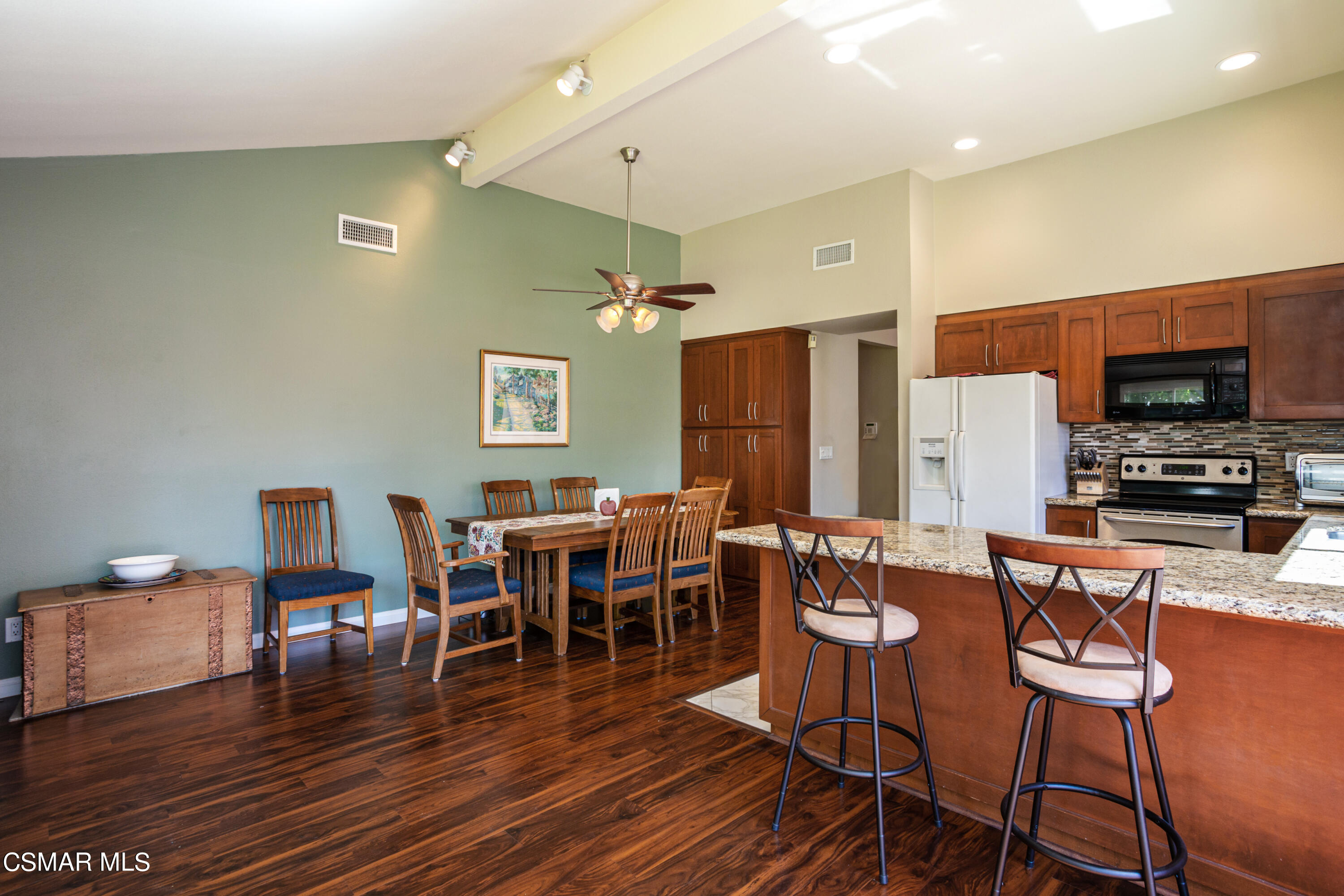 2641 Greenleaf Court Simi Valley, CA 93063 - Photo 5 of 25 a view of a dining room with furniture wooden floor and chandelier