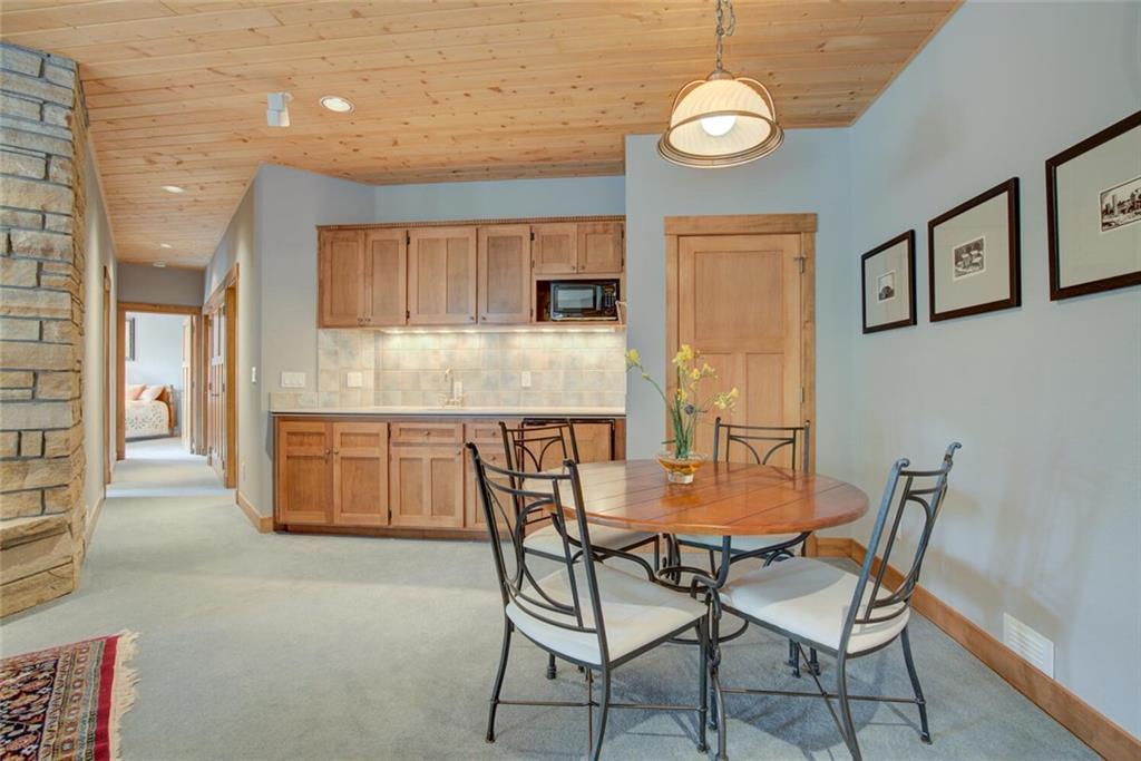 52 Rounds Road Breckenridge, CO 80424 - Photo 15 of 35 a dining room with furniture and window