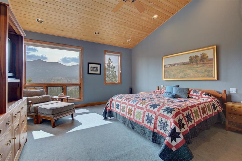 52 Rounds Road Breckenridge, CO 80424 - Photo 17 of 35 a bedroom with a bed and a window