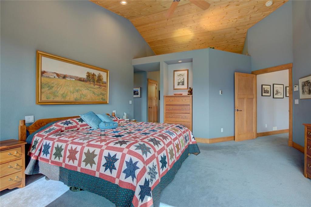52 Rounds Road Breckenridge, CO 80424 - Photo 18 of 35 a bedroom with a bed and dresser
