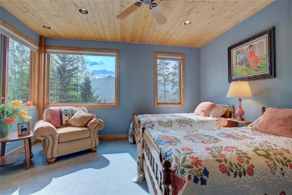 52 Rounds Road Breckenridge, CO 80424 - Photo 23 of 35 a bedroom with bed and a large window
