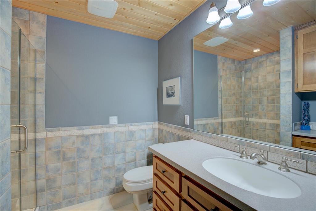 52 Rounds Road Breckenridge, CO 80424 - Photo 24 of 35 a bathroom with a sink toilet and shower