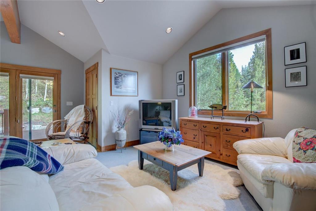 52 Rounds Road Breckenridge, CO 80424 - Photo 27 of 35 a living room with furniture and a flat screen tv