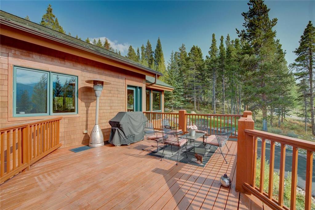 52 Rounds Road Breckenridge, CO 80424 - Photo 28 of 35 a view of a patio with a table chairs and a potted plant