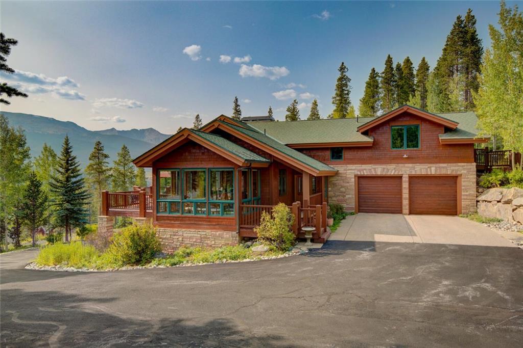 52 Rounds Road Breckenridge, CO 80424 - Photo 5 of 35 a front view of a house with a yard and garage