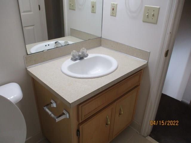 4312 Old Macon Road, Unit 29 Columbus, GA 31907 - Photo 17 of 34 a bathroom with a sink and a mirror