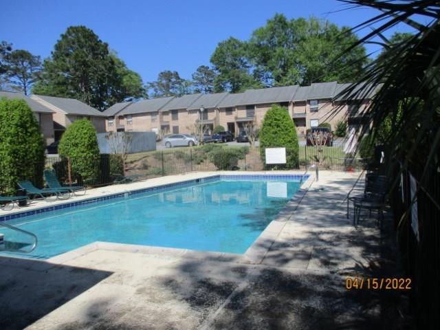 4312 Old Macon Road, Unit 29 Columbus, GA 31907 - Photo 30 of 34 a view of a house with a yard