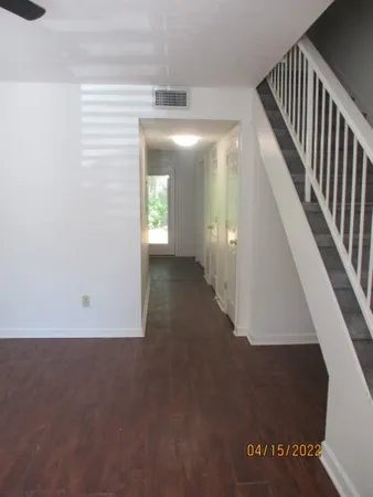 a view of a hallway with entryway