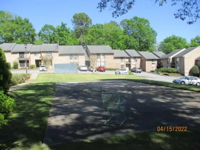 a front view of a house with yard