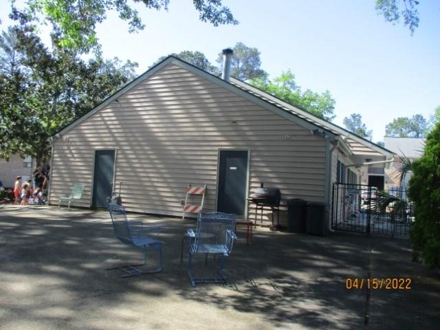 4312 Old Macon Road, Unit 29 Columbus, GA 31907 - Photo 32 of 34 a front view of a house with yard