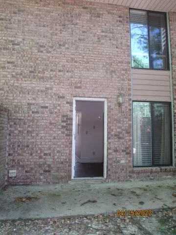 a brick building with a outdoor space