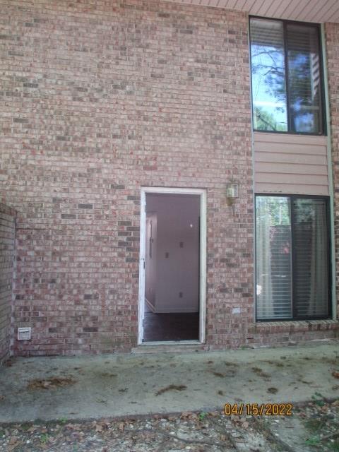4312 Old Macon Road, Unit 29 Columbus, GA 31907 - Photo 10 of 34 a brick building with a outdoor space