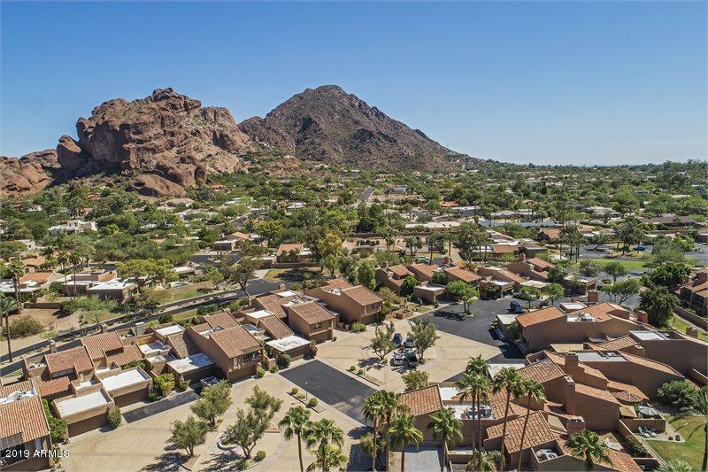 4438 East Camelback Road, Unit 143 Phoenix, AZ 85018 - Photo 30 of 30 an aerial view of residential houses with outdoor space