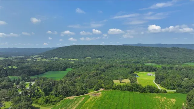 a view of a lake with a big yard