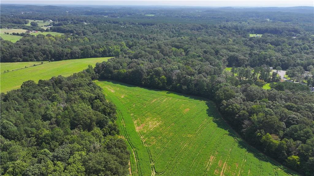 0 Sugar Valley Road Calhoun, GA 30701 - Photo 8 of 20 an aerial view of a houses with yard and green space