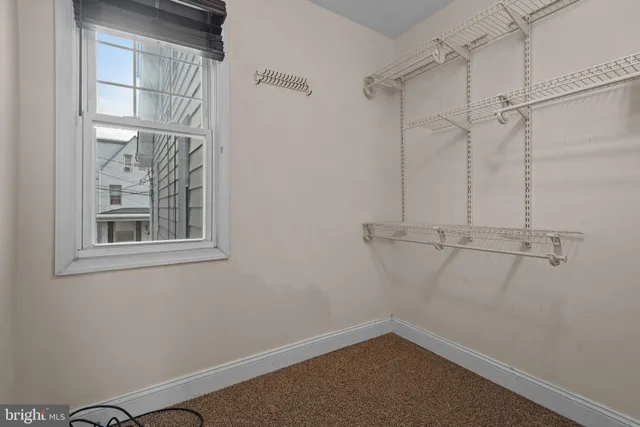 a view of a room with rack on the wall