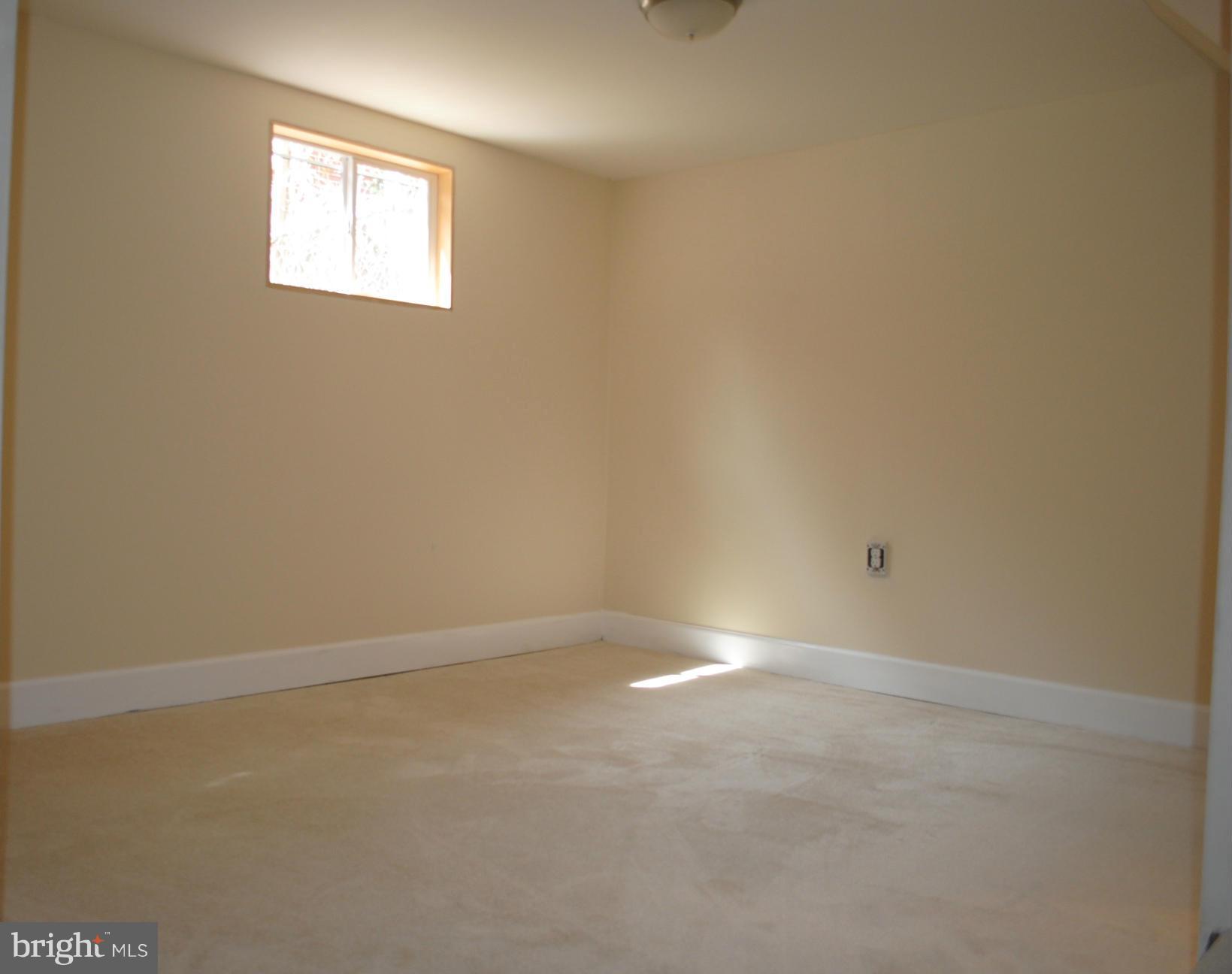 10134 Dallas Avenue Silver Spring, MD 20901 - Photo 19 of 27 an empty room with a window