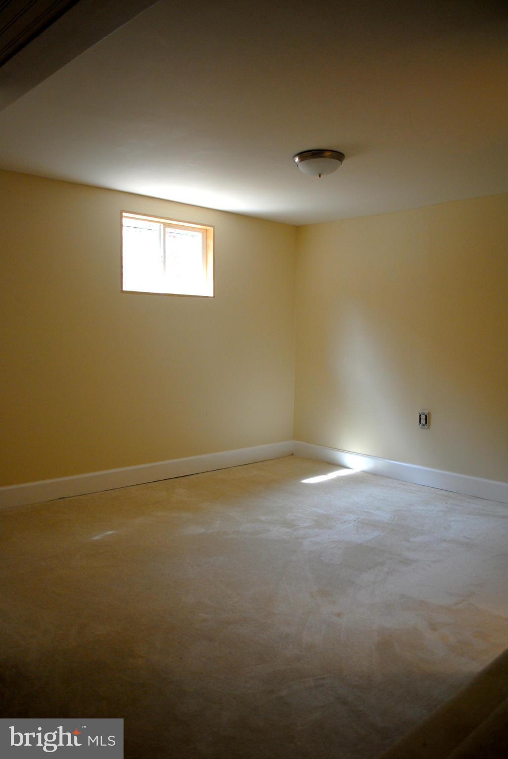 10134 Dallas Avenue Silver Spring, MD 20901 - Photo 21 of 27 a view of an empty room with a window
