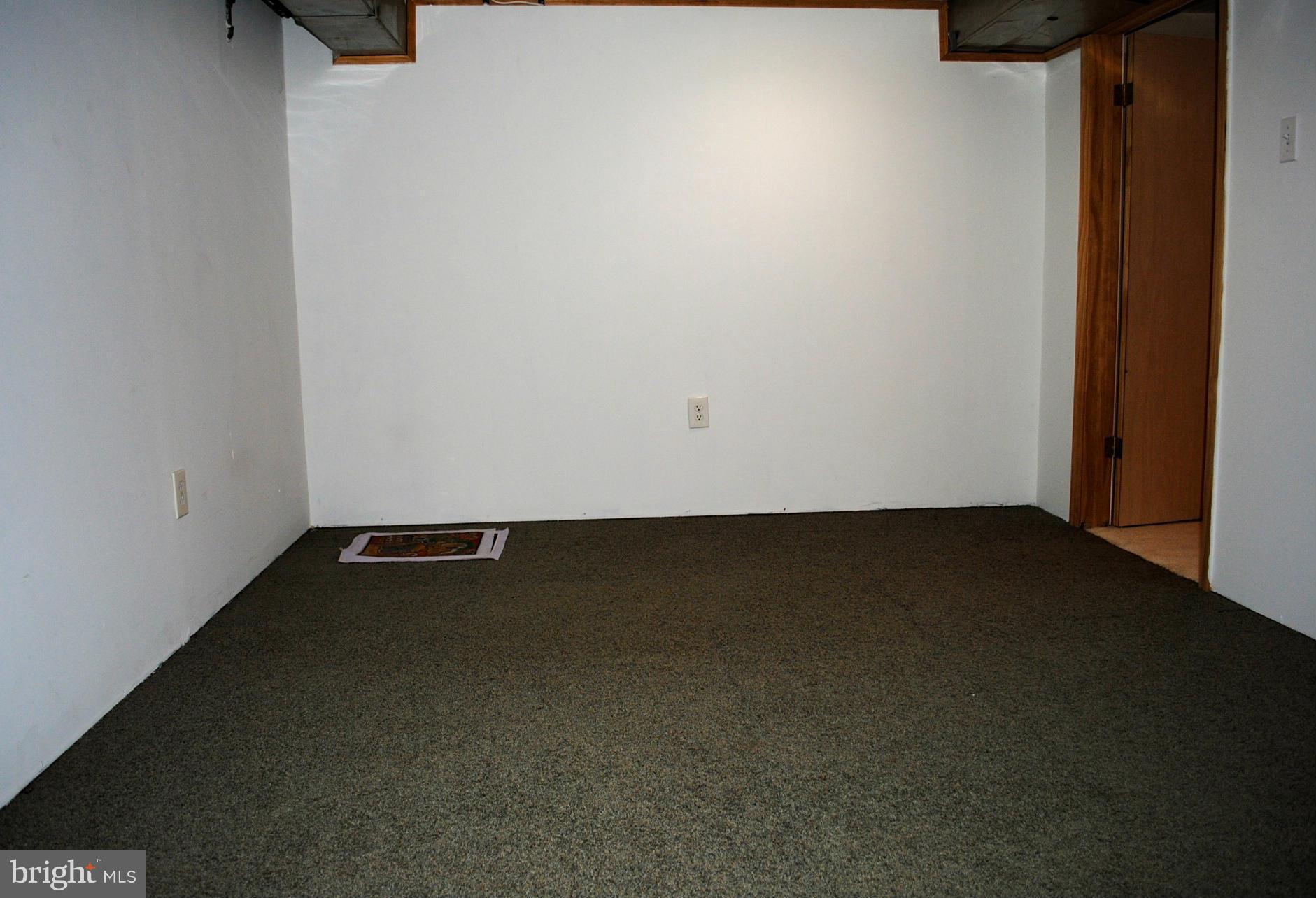 10134 Dallas Avenue Silver Spring, MD 20901 - Photo 22 of 27 a view of room with floor to ceiling window