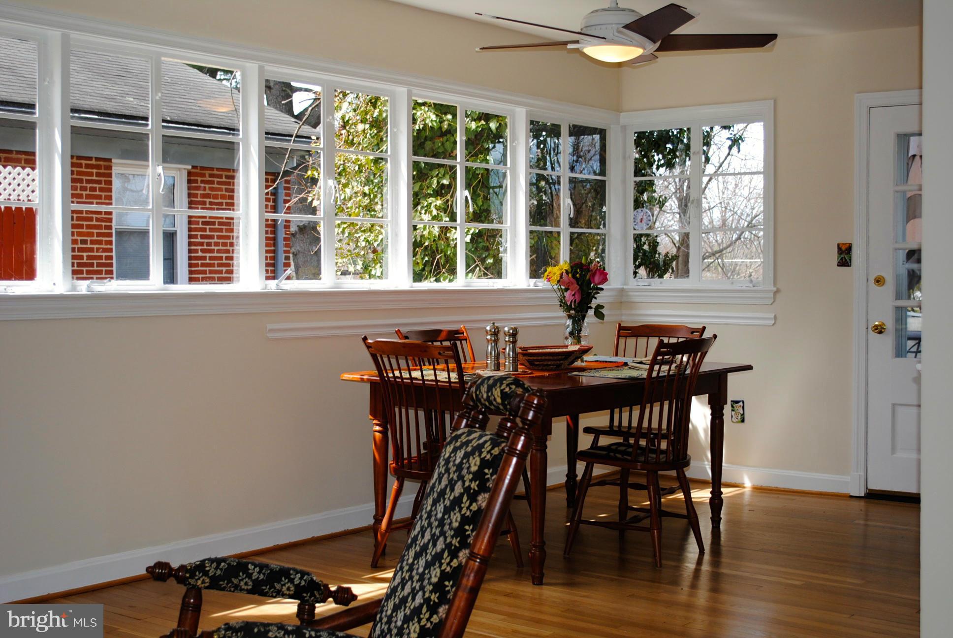 10134 Dallas Avenue Silver Spring, MD 20901 - Photo 9 of 27 a view of a dining room with furniture window and wooden floor