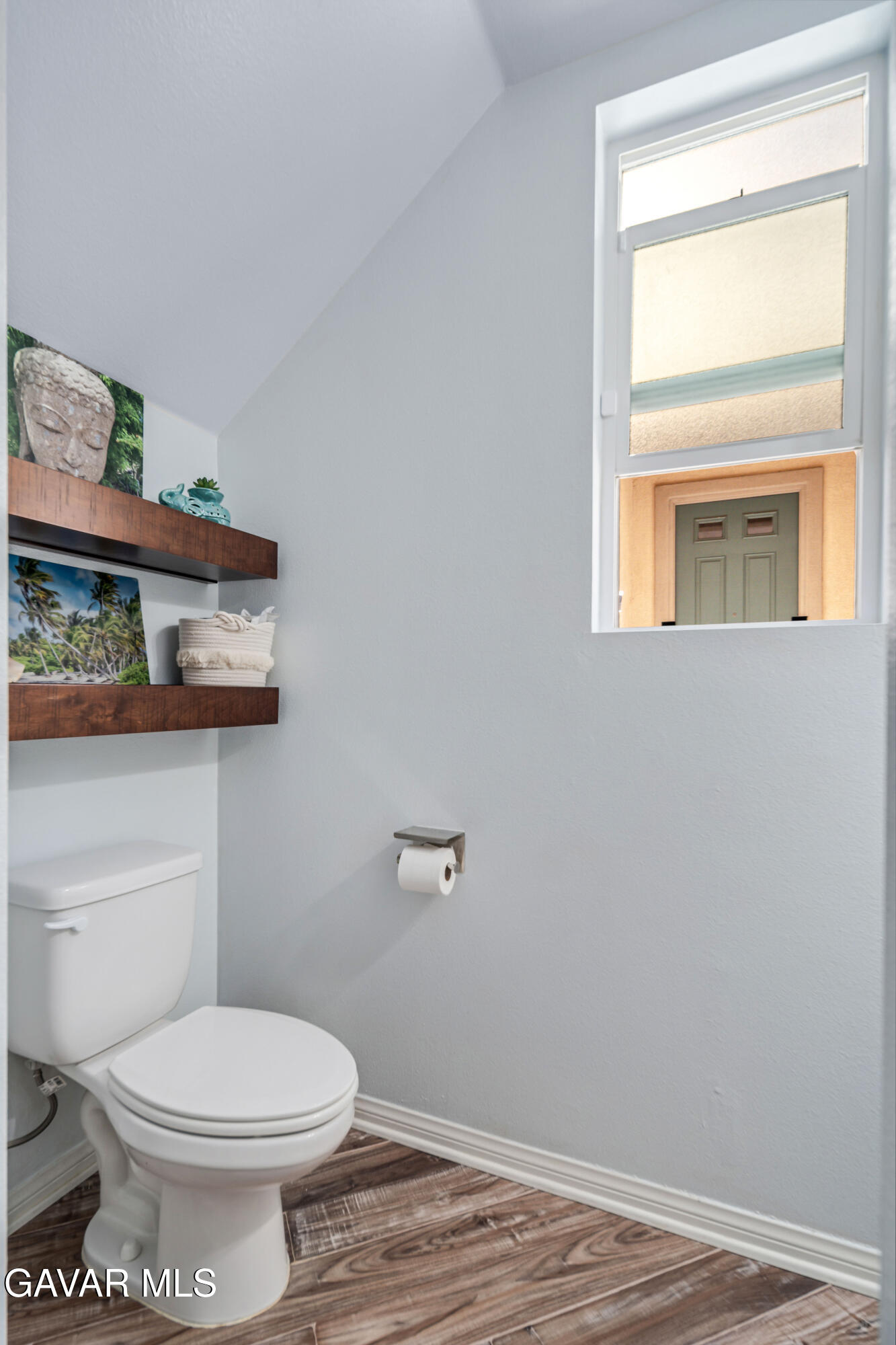 19849 Via Ott Santa Clarita, CA 91321 - Photo 25 of 52 a bathroom with a toilet a sink and a window