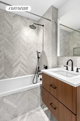 a bathroom with a sink and a bathtub