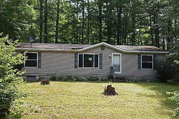 310 Arbor Oak Road Harrison, MI 48625 - Photo 1 of 7 1820511