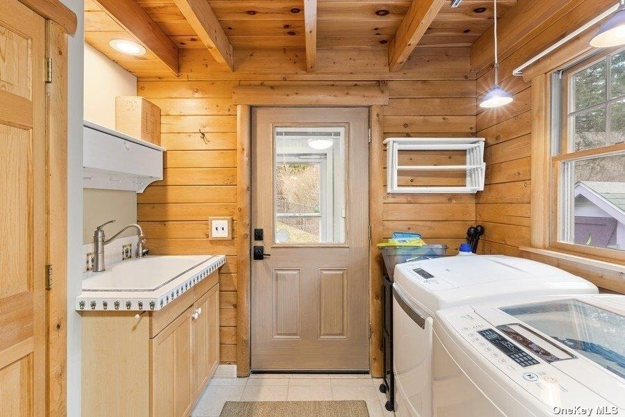 380 Private Road Southold, NY 11971 - Photo 24 of 31 a bathroom with a sink and a washing machine