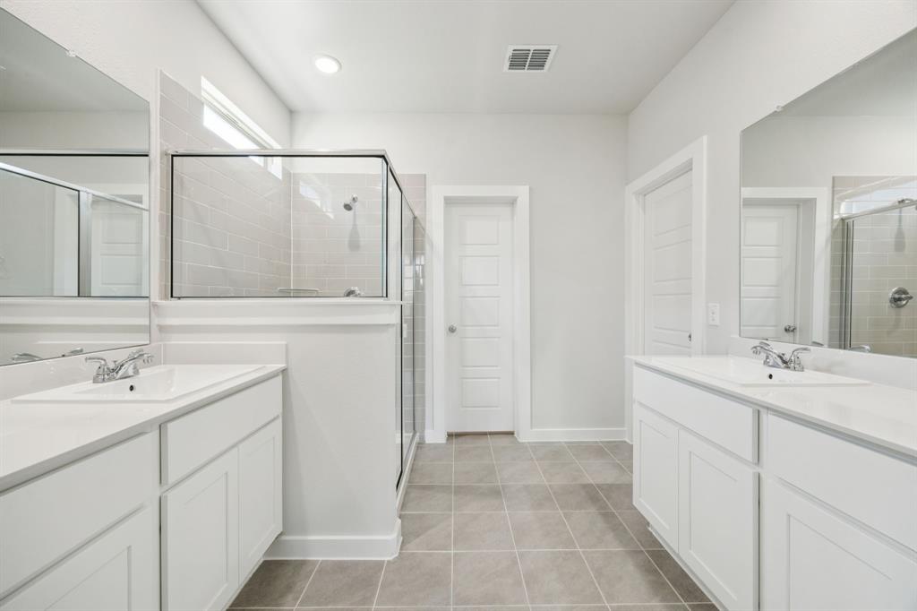 2313 Wind River Road Princeton, TX 75407 - Photo 19 of 35 Primary Bathroom in the Masters home plan by Trophy Signature Homes – REPRESENTATIVE PHOTO