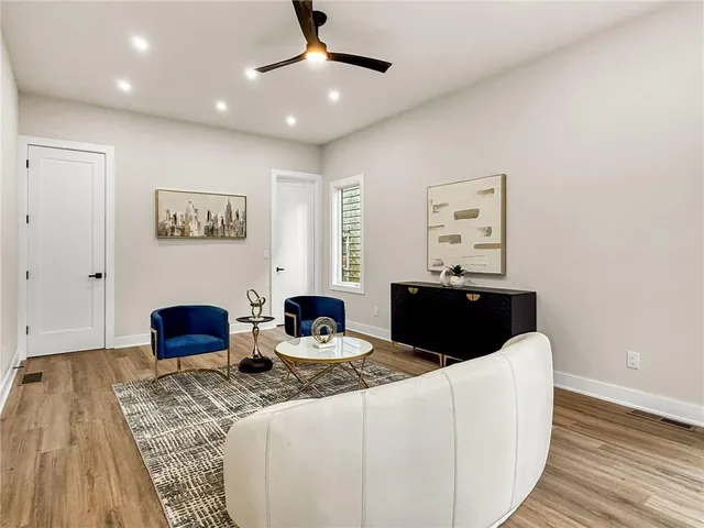a kitchen with a refrigerator and cabinets