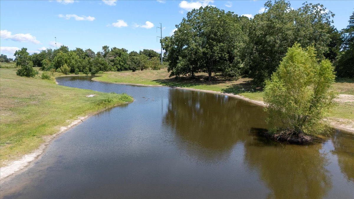 7835 Berger Road Schulenburg, TX 78956 - Photo 34 of 40 Pond-small tree in the pond is a little island where the ducks lay their eggs
