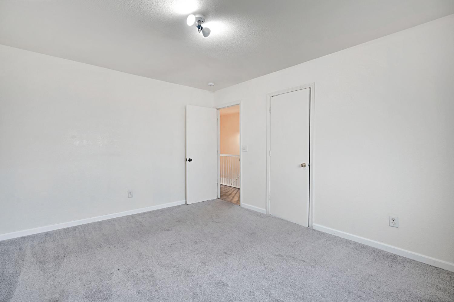 2061 Seventh Street Fresno, CA 93702 - Photo 13 of 38 an empty room with an entryway