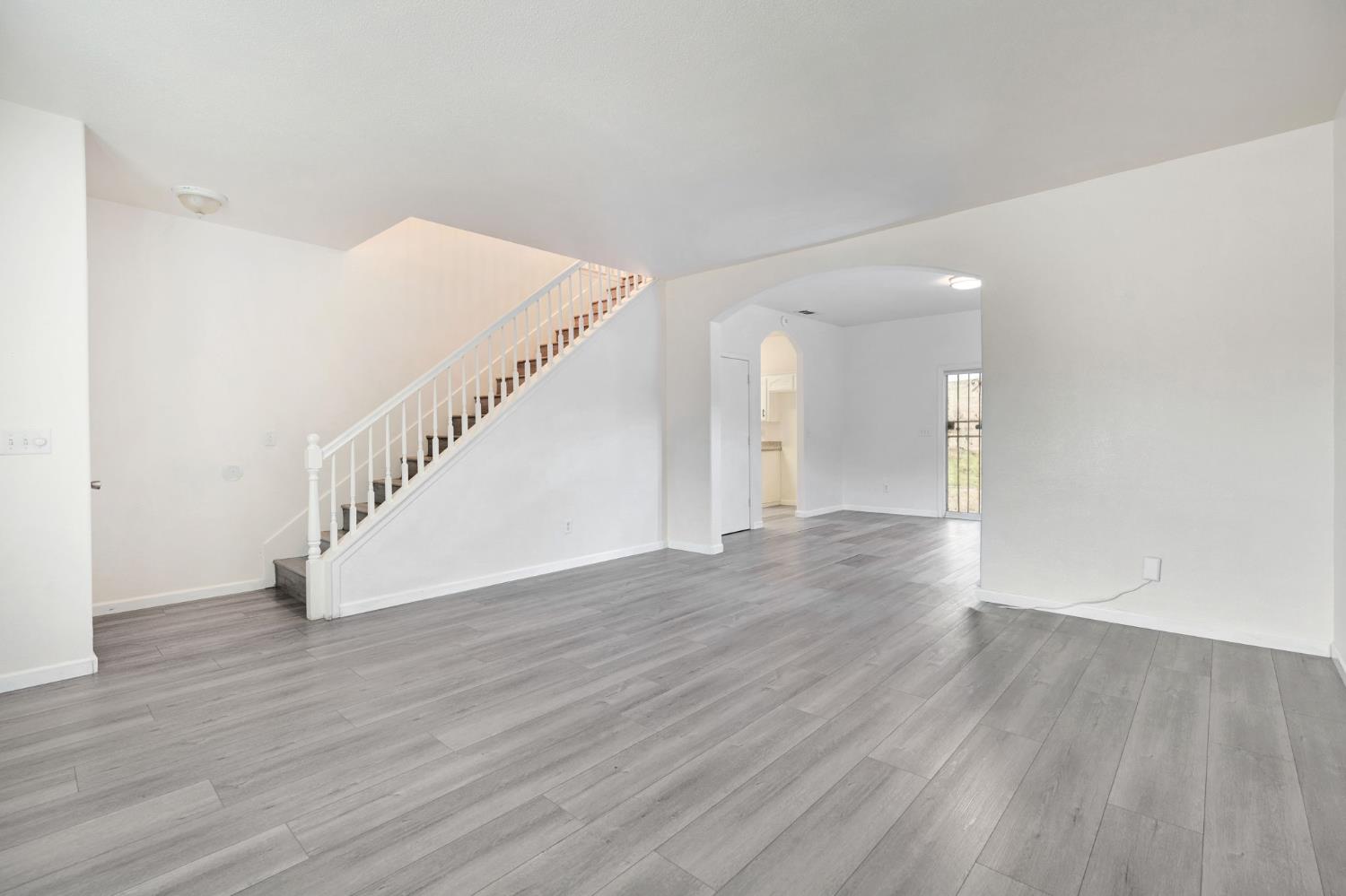 2061 Seventh Street Fresno, CA 93702 - Photo 25 of 38 a view of a hallway with wooden floor