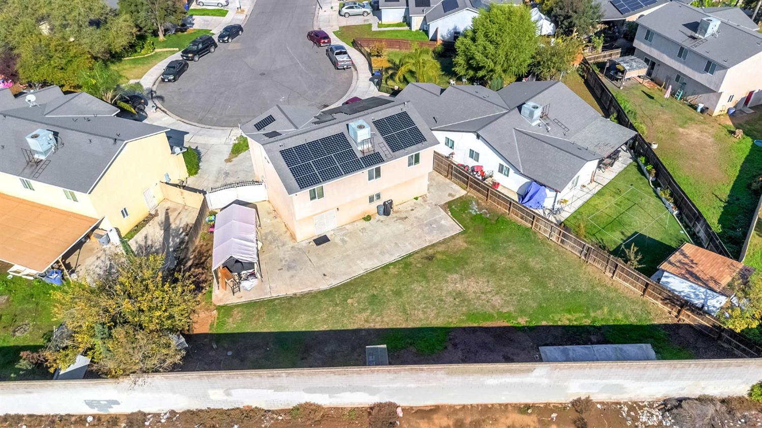 2061 Seventh Street Fresno, CA 93702 - Photo 30 of 38 an aerial view of residential houses with outdoor space